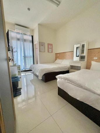 Standard Triple Room | Desk, blackout drapes, soundproofing, free WiFi