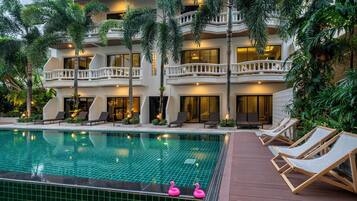 Outdoor pool, open 10:00 AM to 8:00 PM, pool umbrellas, pool loungers
