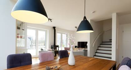 Child-friendly "Traumhuus", e-charging station at the house, handcart, close to the beach