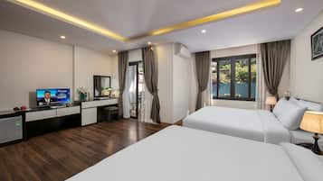 Family Quadruple Room, City View | Minibar, in-room safe, desk, soundproofing
