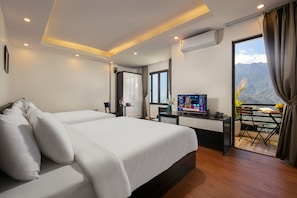Family Quadruple Room, Mountain View | Minibar, in-room safe, desk, soundproofing - Sapa Valley View Hotel (Sa Pa)