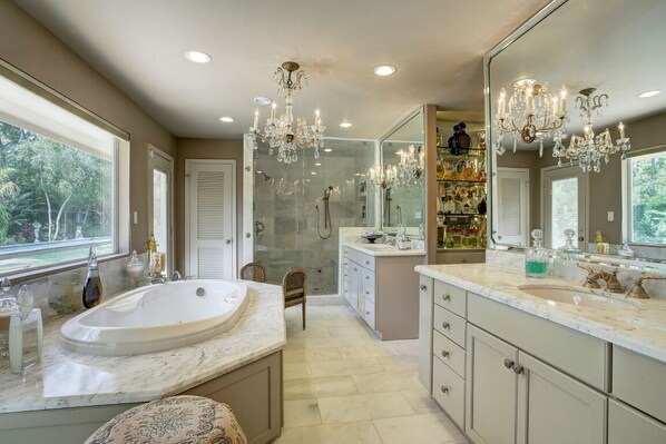 Bathtub, jetted tub, hair dryer, towels
