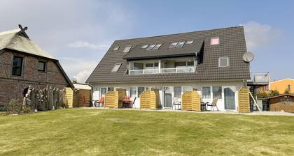 Wohnung 03 mit Terrasse und Boddenblick - MR: Haus Inselperle mit Blick auf den