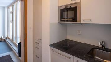 KĂŒhlschrank, Mikrowelle, Toaster, Hochstuhl