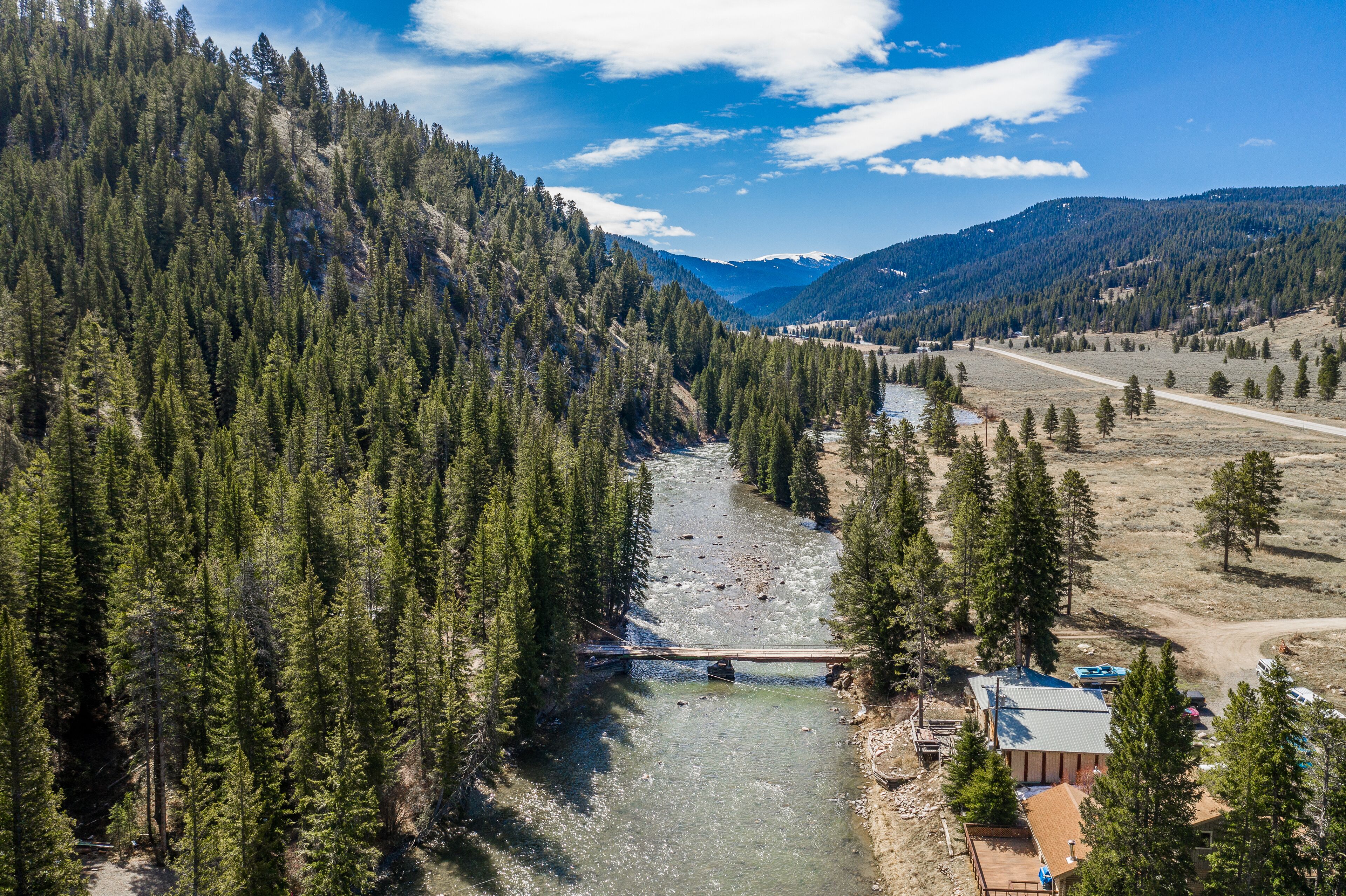 Mountain cabin w/ a wood burning stove, large deck, & river views - near hiking