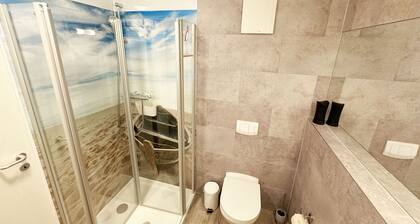 Apartment 02 with terrace and view of the Bodden - MR: Haus Inselperle with view of the
