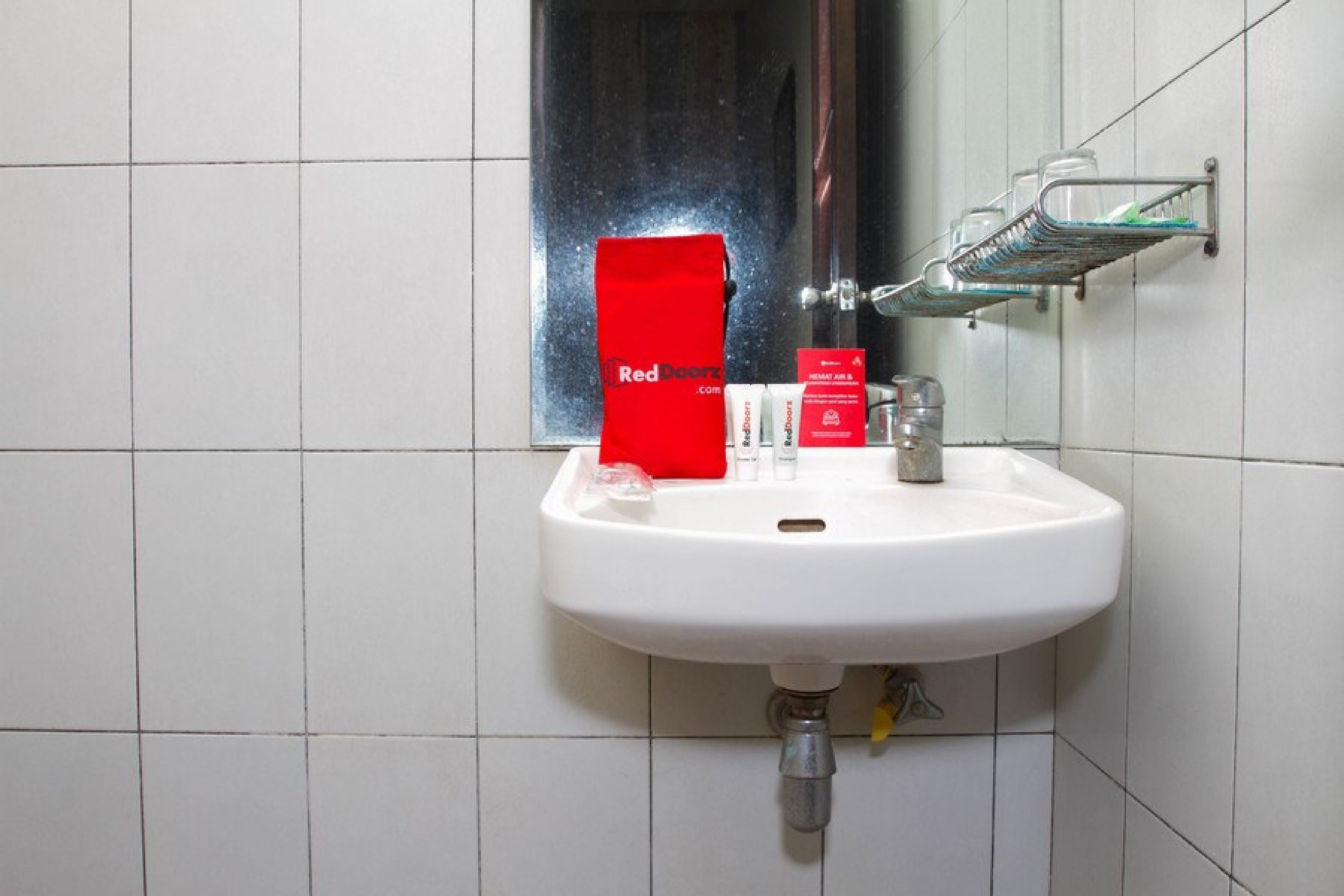 Dusch, gratis toalettartiklar och handdukar