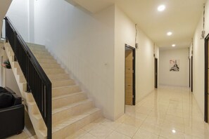 Double Room | In-room dining - RedDoorz Syariah near AP Pettarani 3 (Makassar)