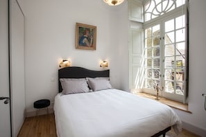 2 bedrooms, soundproofing, iron/ironing board, travel cot