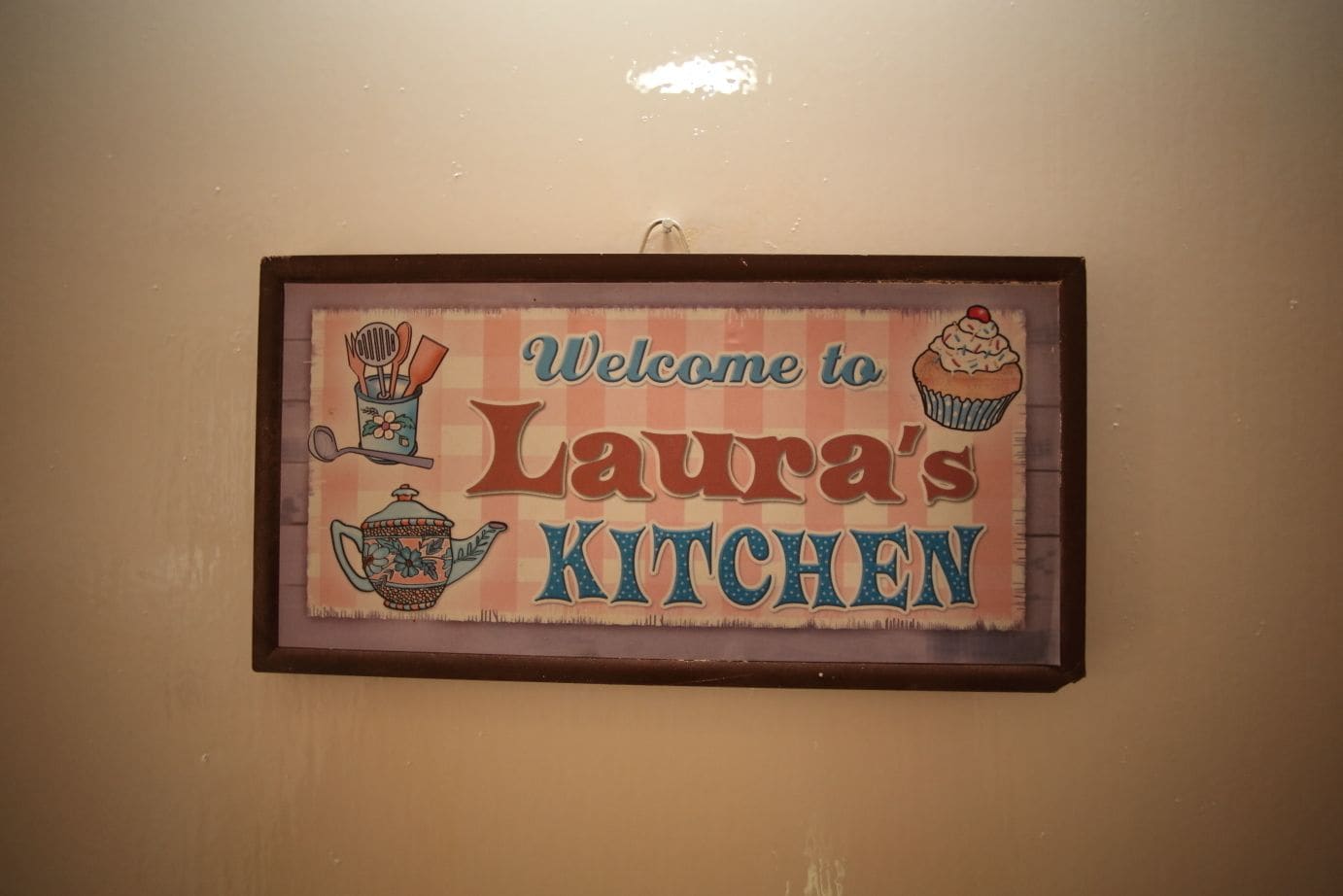 A welcome sign for Laura's Kitchen.