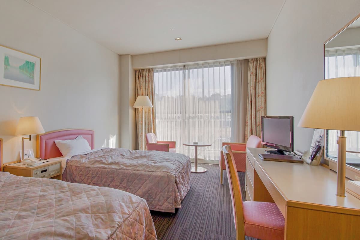 Desk, blackout curtains, free WiFi, bed sheets