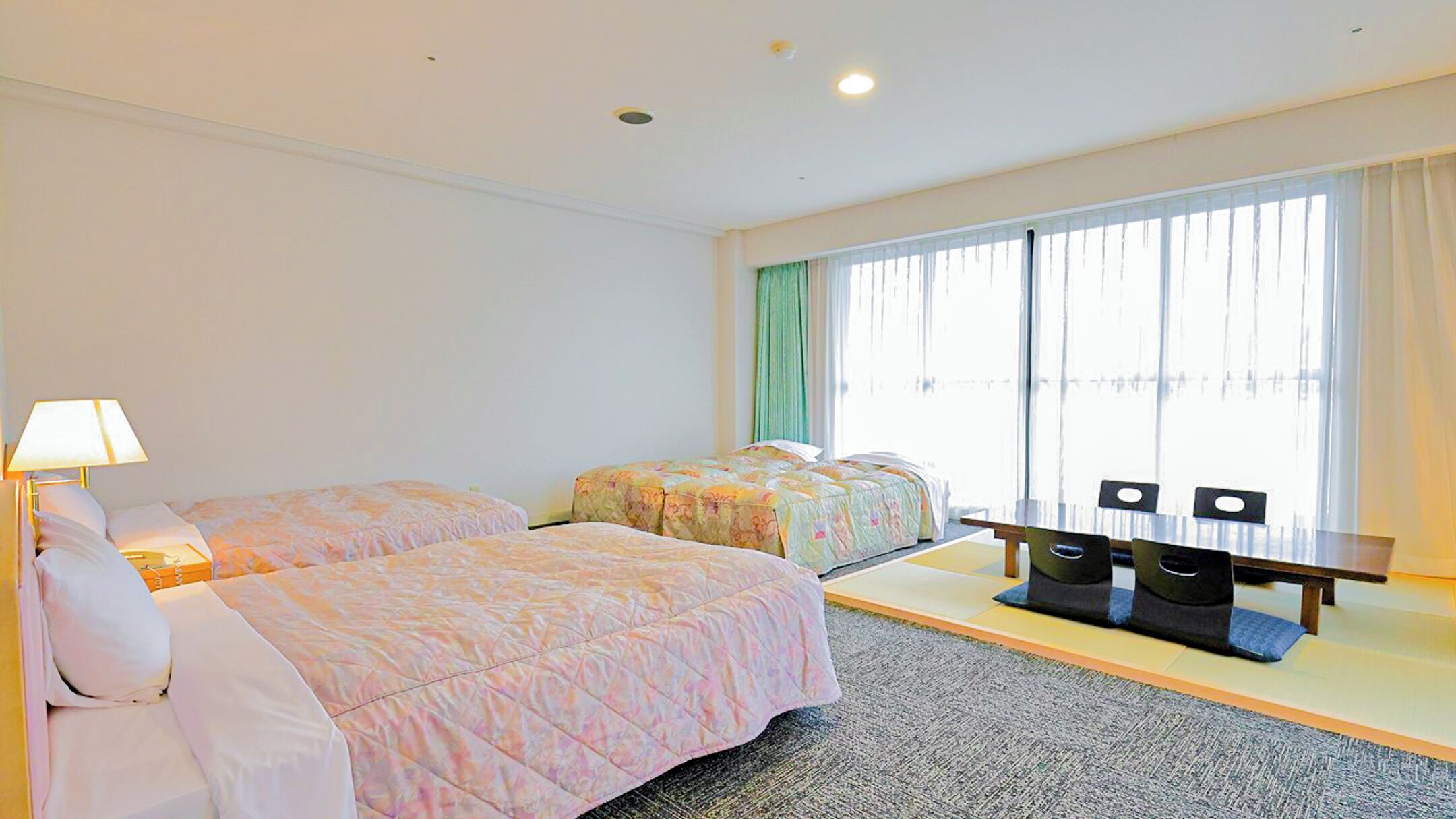 Deluxe Quadruple Room | Desk, blackout drapes, free WiFi, bed sheets