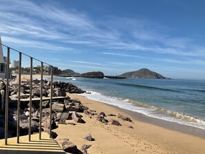 On the beach, sun loungers, beach towels