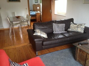 Comfort-Apartment | Wohnbereich | Flachbildfernseher