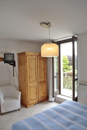 Habitación doble | Caja de seguridad en la habitación, camas extra y ropa de cama