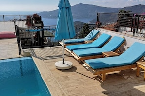 Outdoor pool, pool umbrellas, pool loungers