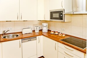 Fridge, microwave, dishwasher, coffee/tea maker