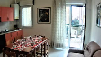 Family Apartment, 2 Bedrooms, Ground Floor | Living area | Flat-screen TV