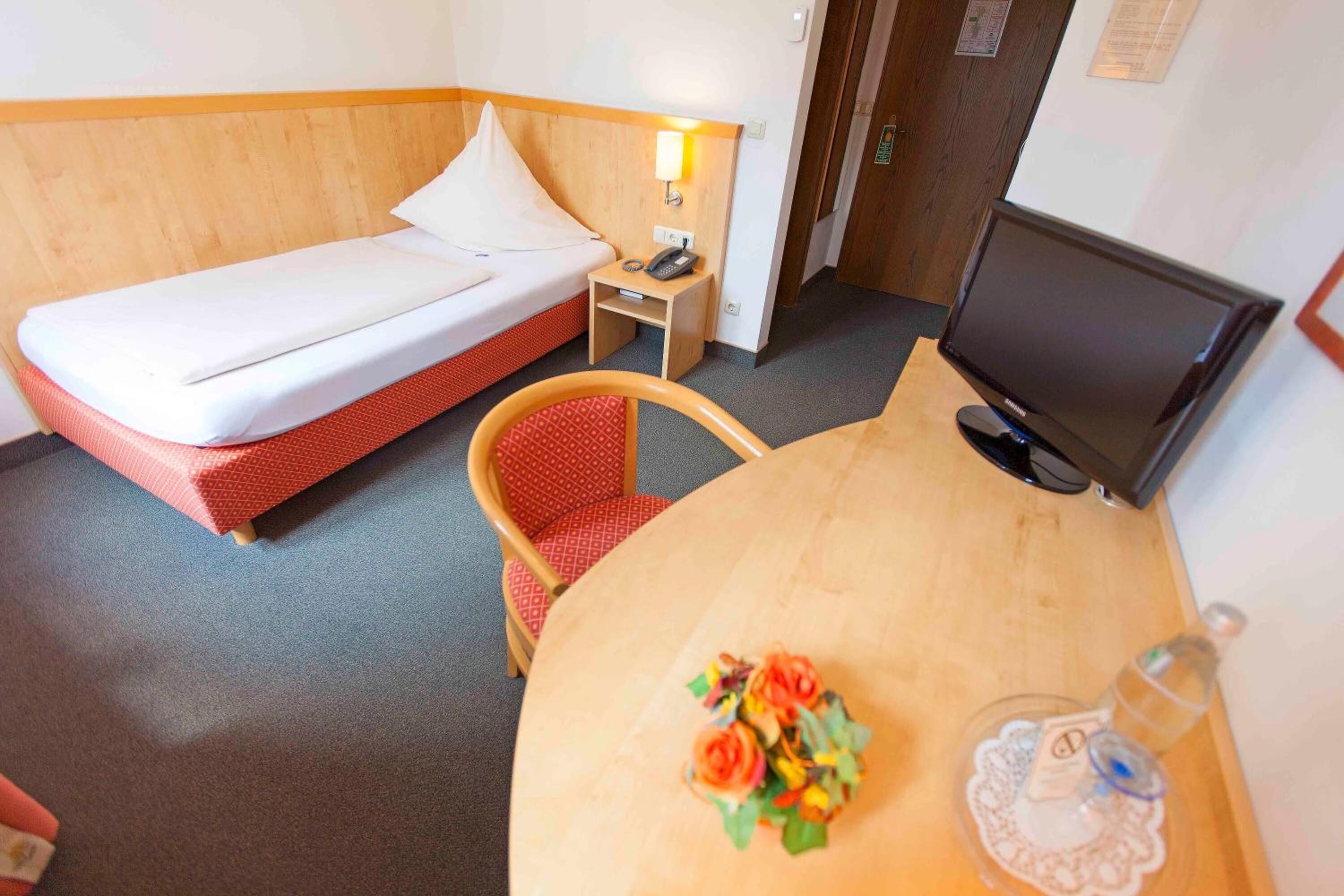 desk, laptop workspace, blackout curtains, iron/ironing board