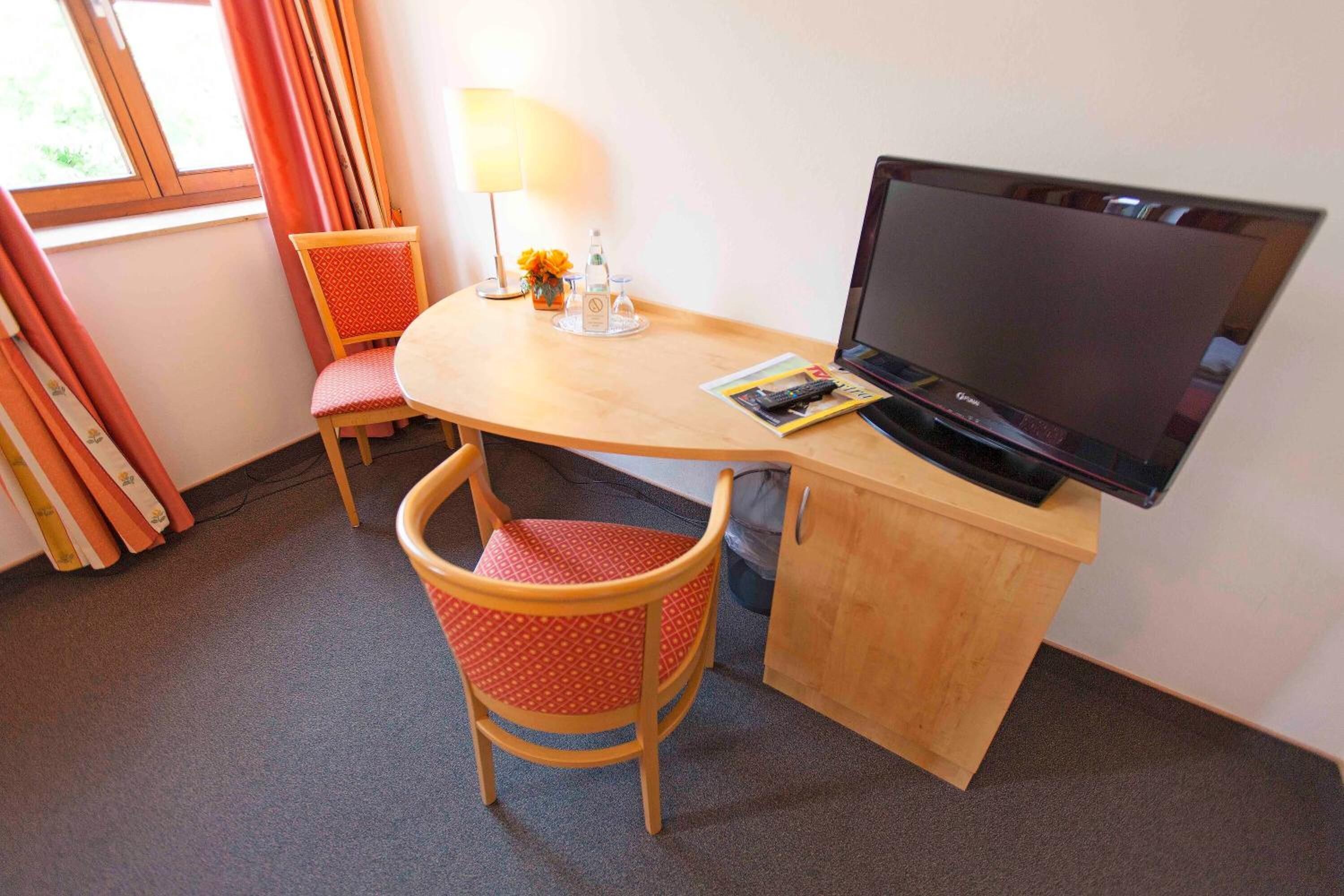 desk, laptop workspace, blackout curtains, iron/ironing board