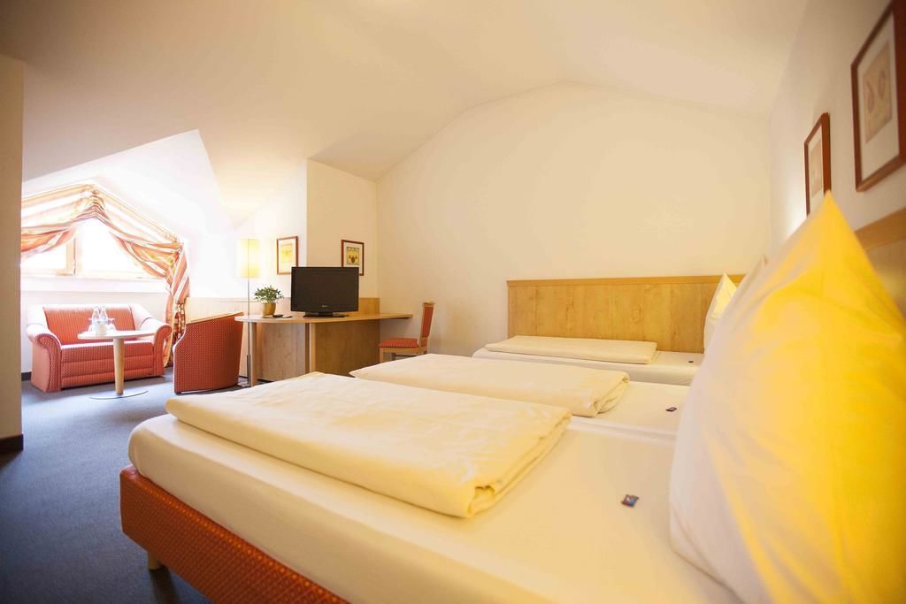 triple room | desk, laptop workspace, blackout curtains, iron/ironing board