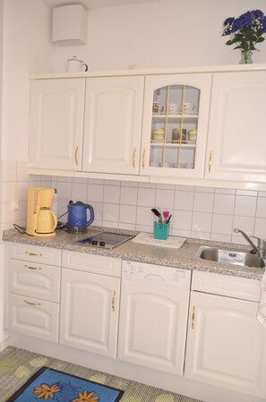 Fridge, microwave, dishwasher, coffee/tea maker