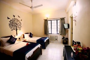 Deluxe Room, Garden View | Egyptian cotton sheets, premium bedding, down duvets