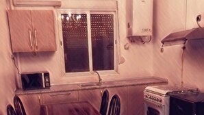 Deluxe Apartment | Private kitchen - Appart Hotel Costa Aya (Algiers)