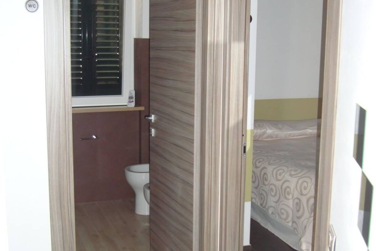Desk, blackout curtains, soundproofing, rollaway beds