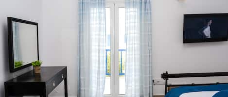 Comfort Apartment | Living area | TV