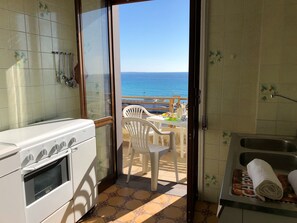 Apartamento, 2 habitaciones | Cocina privada | Frigorífico grande, horno, placa de cocina y máquina de café espresso