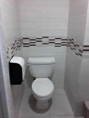 Basic Room, 2 Double Beds | Bathroom | Shower, free toiletries - The Garden Hotel y Restaurant (Punta Cana)