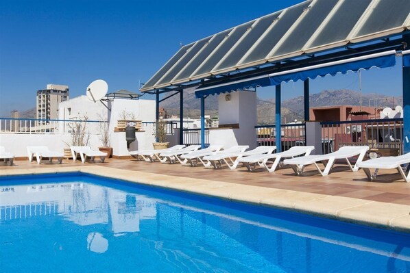 Outdoor pool, pool loungers