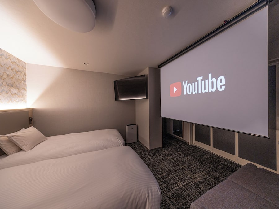 Tomannsrom – premium, 2 enkeltsenger, ikke-røyk | Oppholdsområde | Flatskjerm-TV