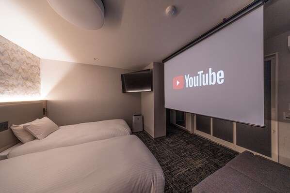 Habitación Premium con 2 camas individuales, 2 camas individuales, para no fumadores | Área de sala de estar | Televisión de pantalla plana