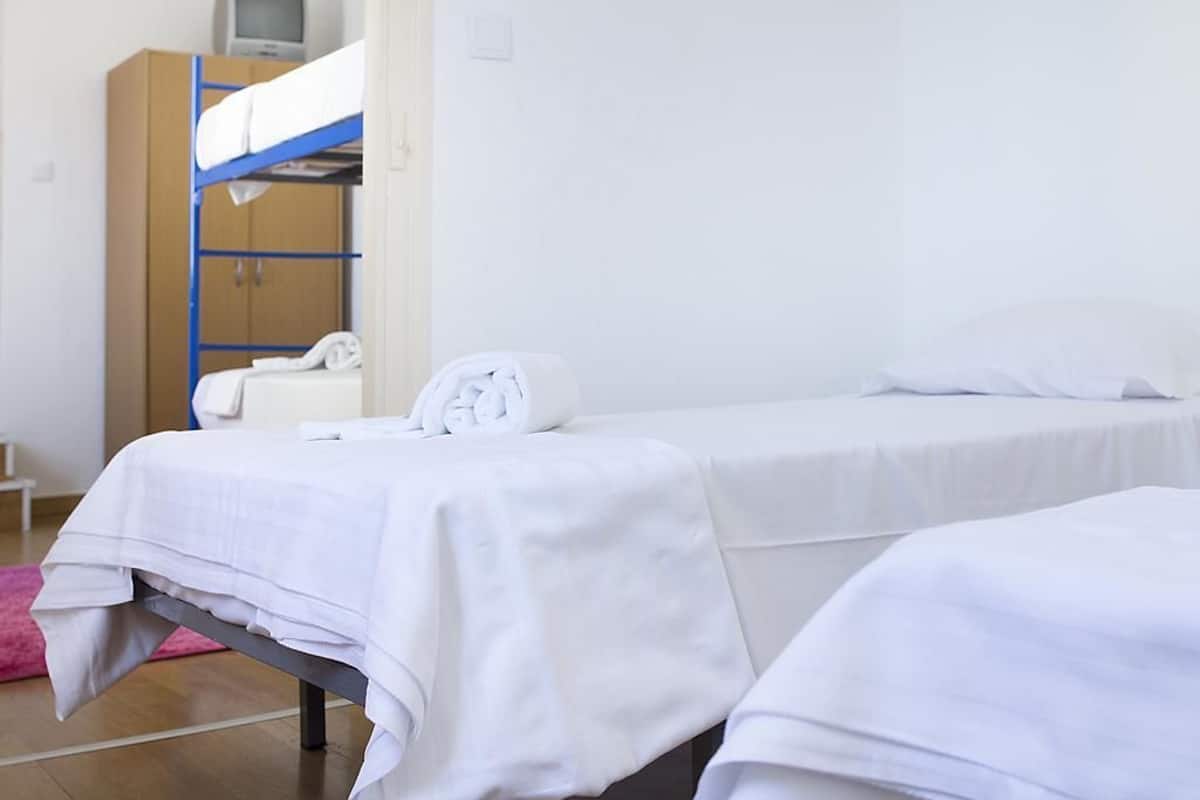 Quadruple Room, Shared Bathroom | 1 bedroom, blackout drapes, free WiFi, bed sheets