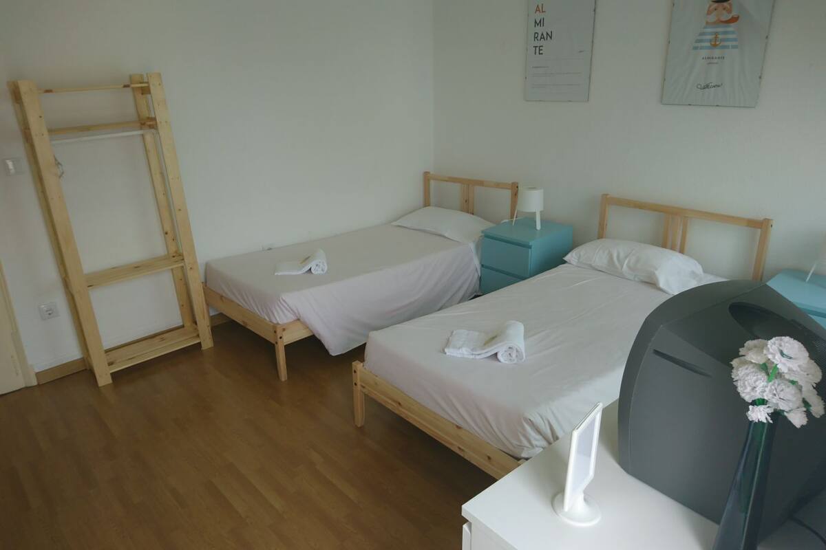 Twin Room, Private Bathroom | 1 bedroom, blackout drapes, free WiFi, bed sheets
