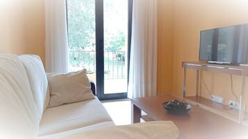 Suite junior, Terraza | Cunas gratuitas y ropa de cama