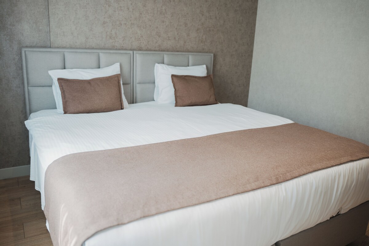 Departamento junior, 1 habitación | Cortinas blackout, insonorización, wifi gratis y ropa de cama