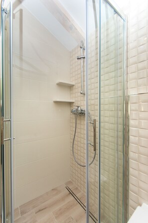 Studio, Sea View | Bathroom | Shower, hair dryer, towels, soap