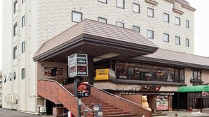 A multi-story hotel with a prominent sign for 'ANNEX'. - Annex Hotel Mimatsu (Mito)