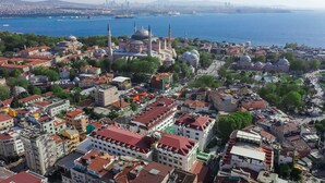 An aerial view of a historic city with prominent domed buildings and a waterfront. - Sura Luxury Million & Spa (Istanbul)
