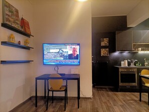 City Apartment, 2 Bedrooms | Living area | Flat-screen TV