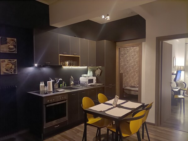 City Apartment, 2 Bedrooms | Private kitchen | Full-sized fridge, oven, stovetop, coffee/tea maker
