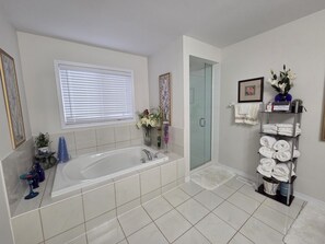 Bathtub, hair dryer, towels, soap