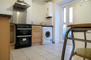 Apartment | Private kitchen | Full-size fridge, microwave, oven, stovetop