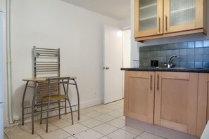 Apartment | Private kitchen | Full-size fridge, microwave, oven, stovetop
