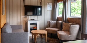 Chalet, 2 Bedrooms, Terrace (Le Soleil) | Living area | TV, fireplace