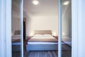 2 chambres, fer et planche à repasser, lit parapluie, Wi-Fi gratuit