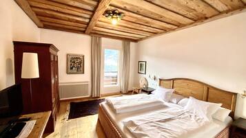 2 habitaciones, tabla de planchar con plancha y cuna de viaje